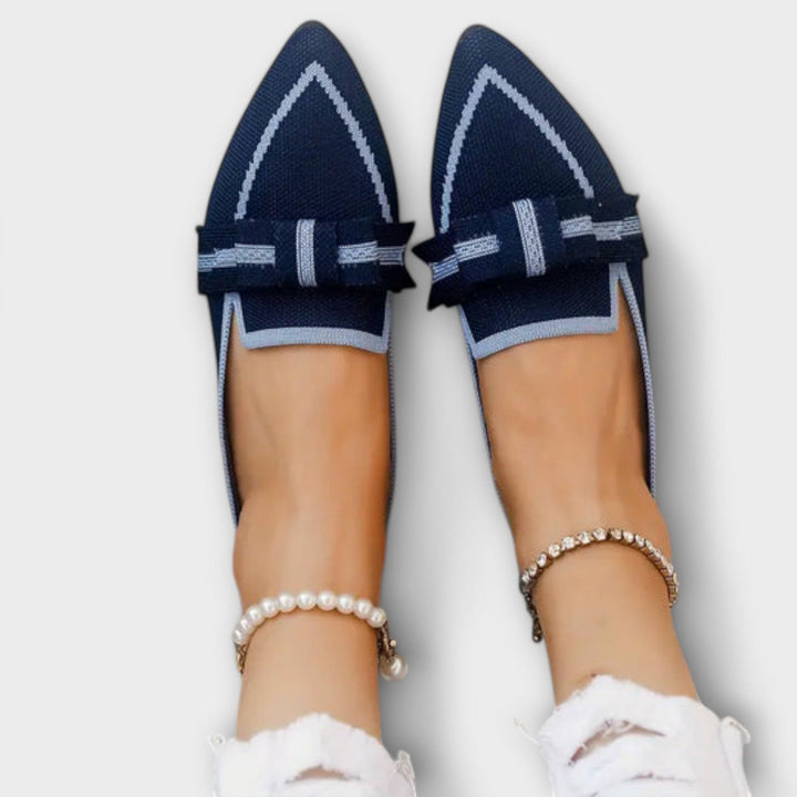 Flat ladies' shoes with tied design